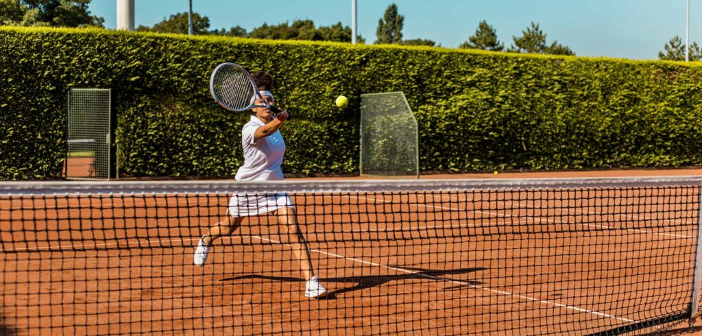 Tennissende vrouw - © Lorado (iStock)